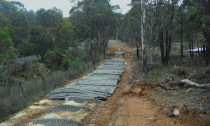 Flintstone Blastmats. Size used : 2.9*2.4m weight ~450 kg per mat. Used for blasting protection on the Maquarie pipeline project , Orange NSW.